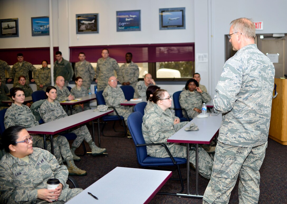 Col. Steven Parker, commander, 914th Airlift Wing addresses members of the unit before Wingman Day at Niagara Falls Air Reserve Station, N.Y., Feb. 7, 2015. This year's event focused on suicide prevention and fostering positive relationships. (U.S. Air Force photo Tech. Sgt. Stephanie Sawyer)