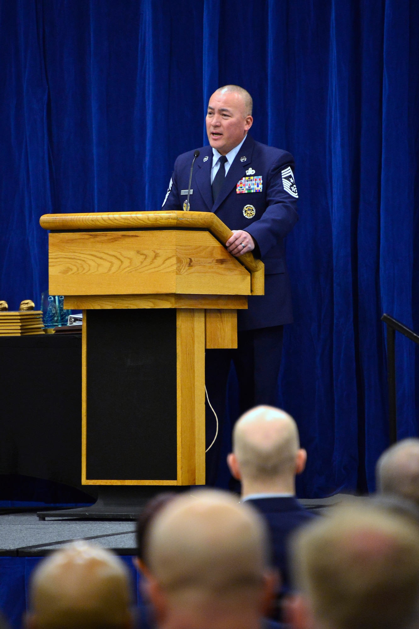 MCGHEE TYSON AIR NATIONAL GUARD BASE, Tenn. - Chief Master Sgt. Mitchell O. Brush, the senior enlisted advisor to the Chief, National Guard Bureau, speaks to at least 270 graduates of NCO Academy and Airman Leadership School who completed thier studies here, Feb. 12, 2015, at the Paul H. Lankford Enlisted PME Center, I.G. Brown Training and Education Center.(U.S. Air National Guard photo by Senior Master Sgt. Paul Mann/Released)