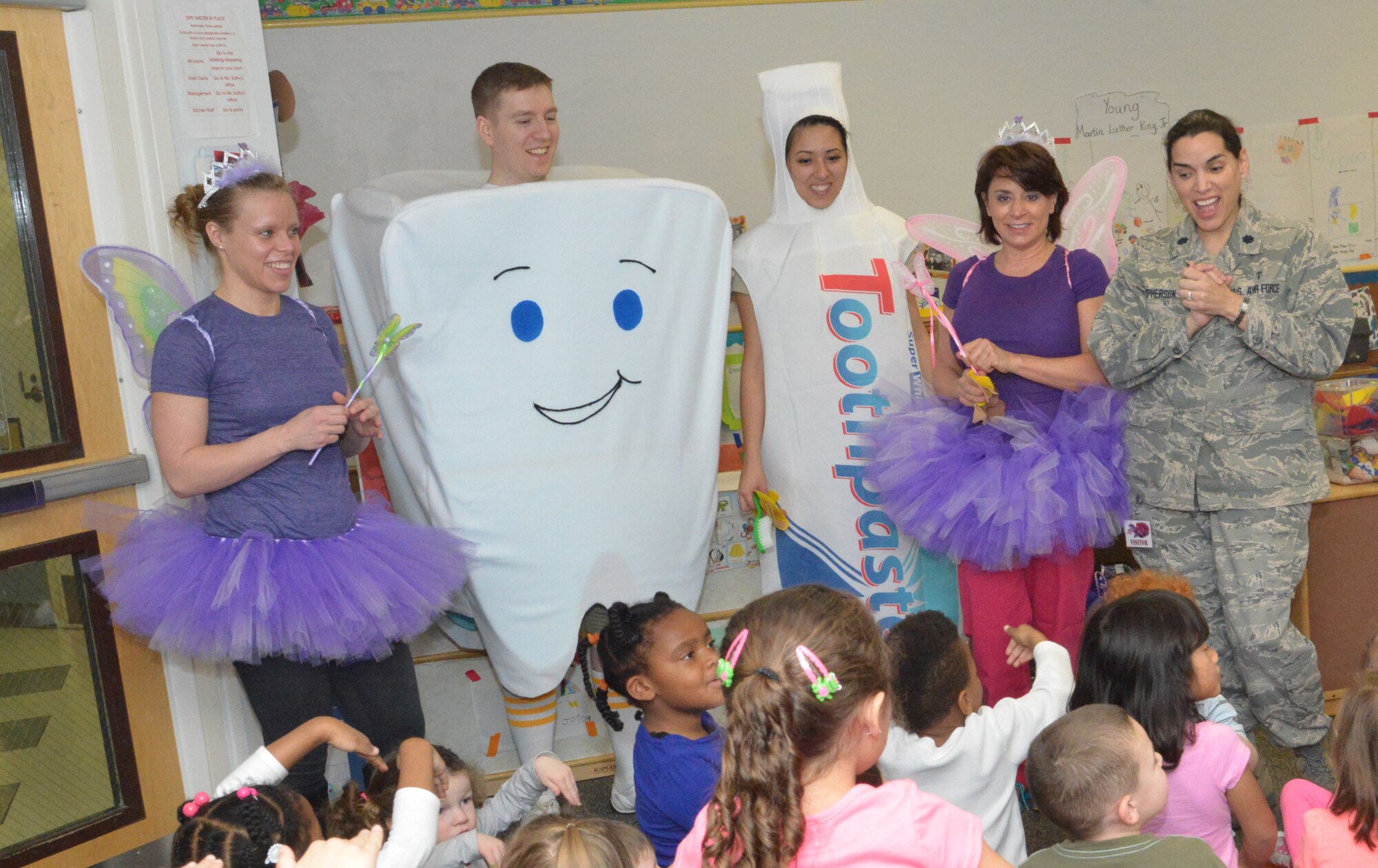 78th Dental Squadron representatives share healthy habits with students at the Child Development Center, February 10, 2015. (U.S. Air Force photo by Ray Crayton)