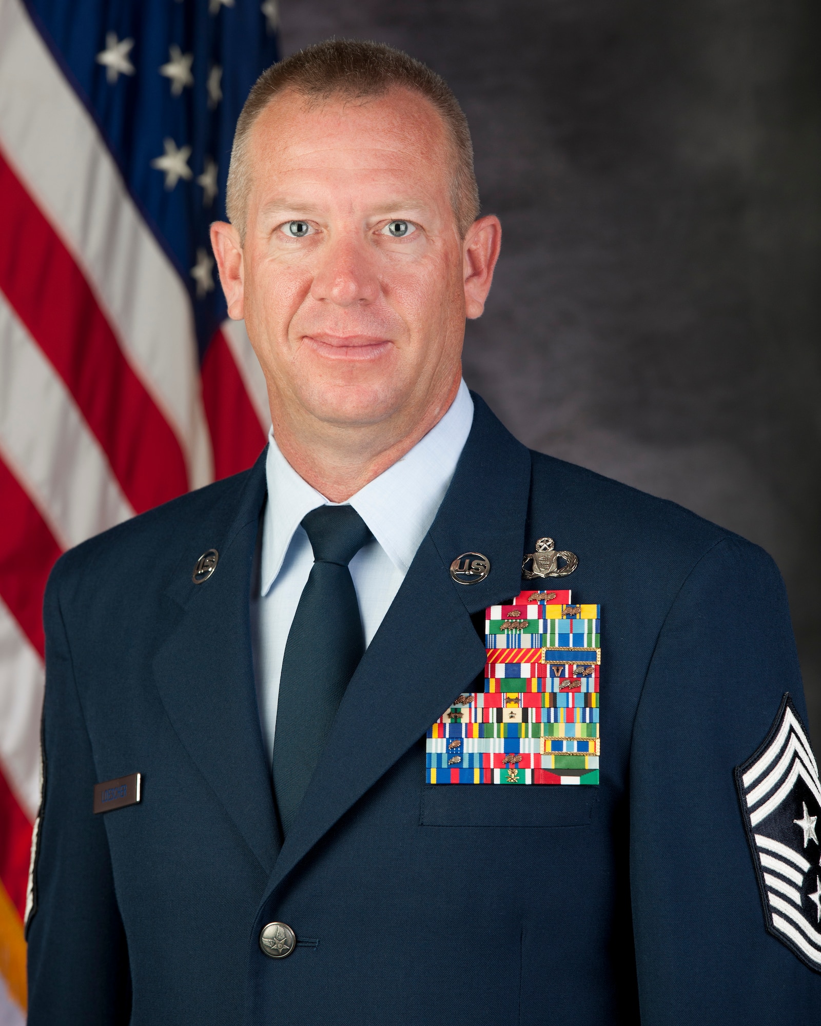 Official photo of Chief Master Sgt. Scott Loescher, 49th Wing Command Chief Master Sgt. (U.S. Air Force photo by Senior Airman Daniel Liddicoet/released) 