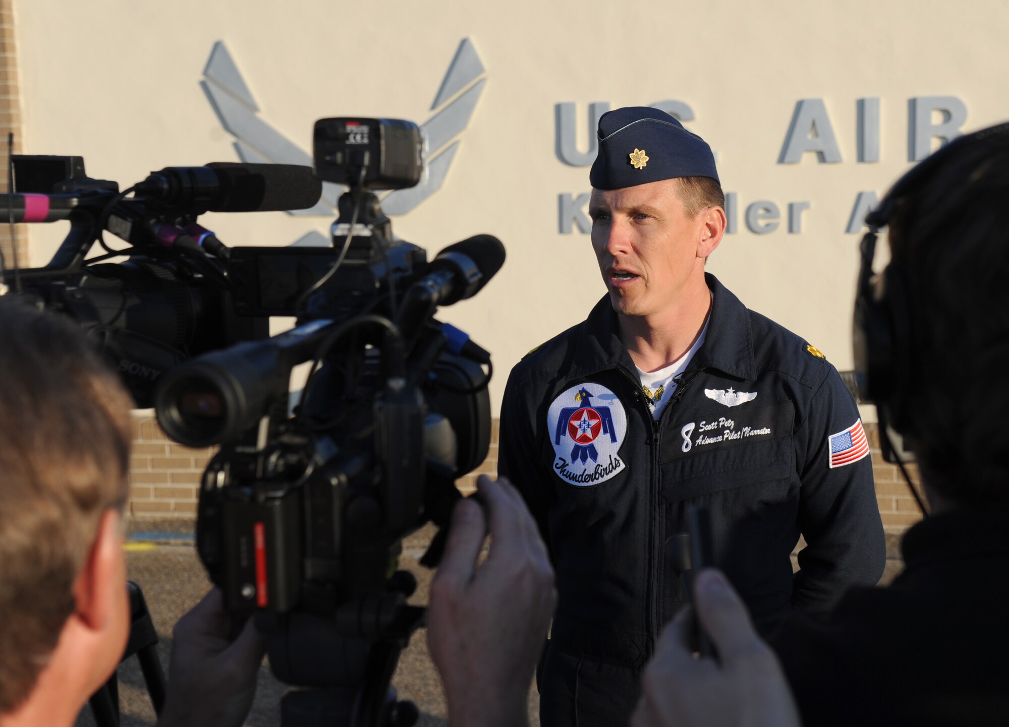 Maj. Scott Petz, U.S. Air Force Thunderbirds advance pilot number 8, addresses local media during a press conference Feb. 11, 2015, on the flight line at Keesler Air Force Base, Miss. The conference was in conjunction with a site survey visit in preparation for the upcoming Air Show/Open House March 28-29. The Thunderbirds will are scheduled to headline the event.  (U.S. Air Force photo by Kemberly Groue)