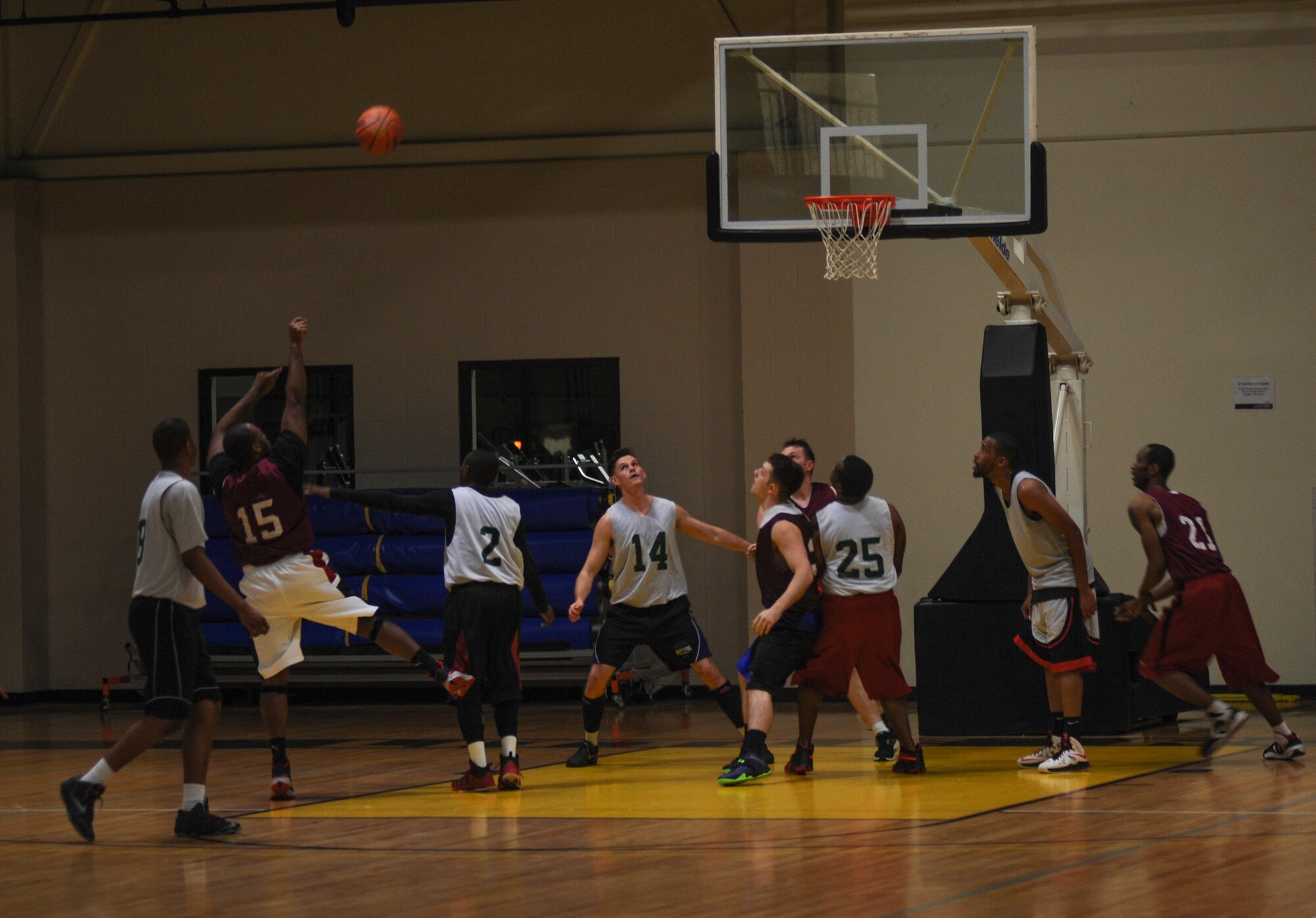 A member of the 19th Maintenance Squadron puts up a shot while playing against the 19th Logistics Readiness Squadron team 1 Feb. 10, 2015, at Little Rock Air Force Base, Ark. The final score was 65-45, 19th LRS. (U.S. Air Force photo by Airman 1st Class Harry Brexel)
