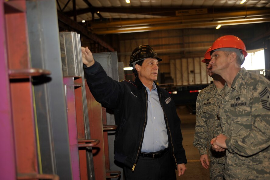 Chief Master Sgt. Christian Pugh, 92nd Air Refueling Wing command chief, and Col. Brian McDaniel, 92nd Air Refueling Wing commander, learn from Craig Dias, Vice President of Haskins Steel Co., Inc. and Fairchild Air Force Base honorary commander, about the different services the company provides Feb. 12, 2015, at the Haskins Steel Co., Inc., Spokane Wash. Haskins Steel is a close supporter of the base, providing financial support for Airman and family morale events as well as striving to ensure at least 20 percent of their staff are military veterans. (U.S. Air Force photo/Airman 1st Class Taylor Bourgeous)