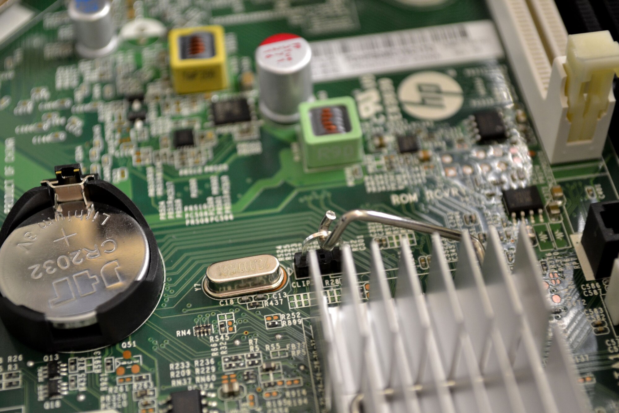 A computer motherboard is seen in the 111th Communications Flight shop on Jan. 23, 2015 at Horsham Air Guard Station, Pa. On March 2, the 111th Attack Wing will begin to migrate its computers and users into a central Air Force Network dubbed AFNET over a 3-week period. (U.S. Air National Guard photo by Master Sgt. Christopher Botzum/Released)