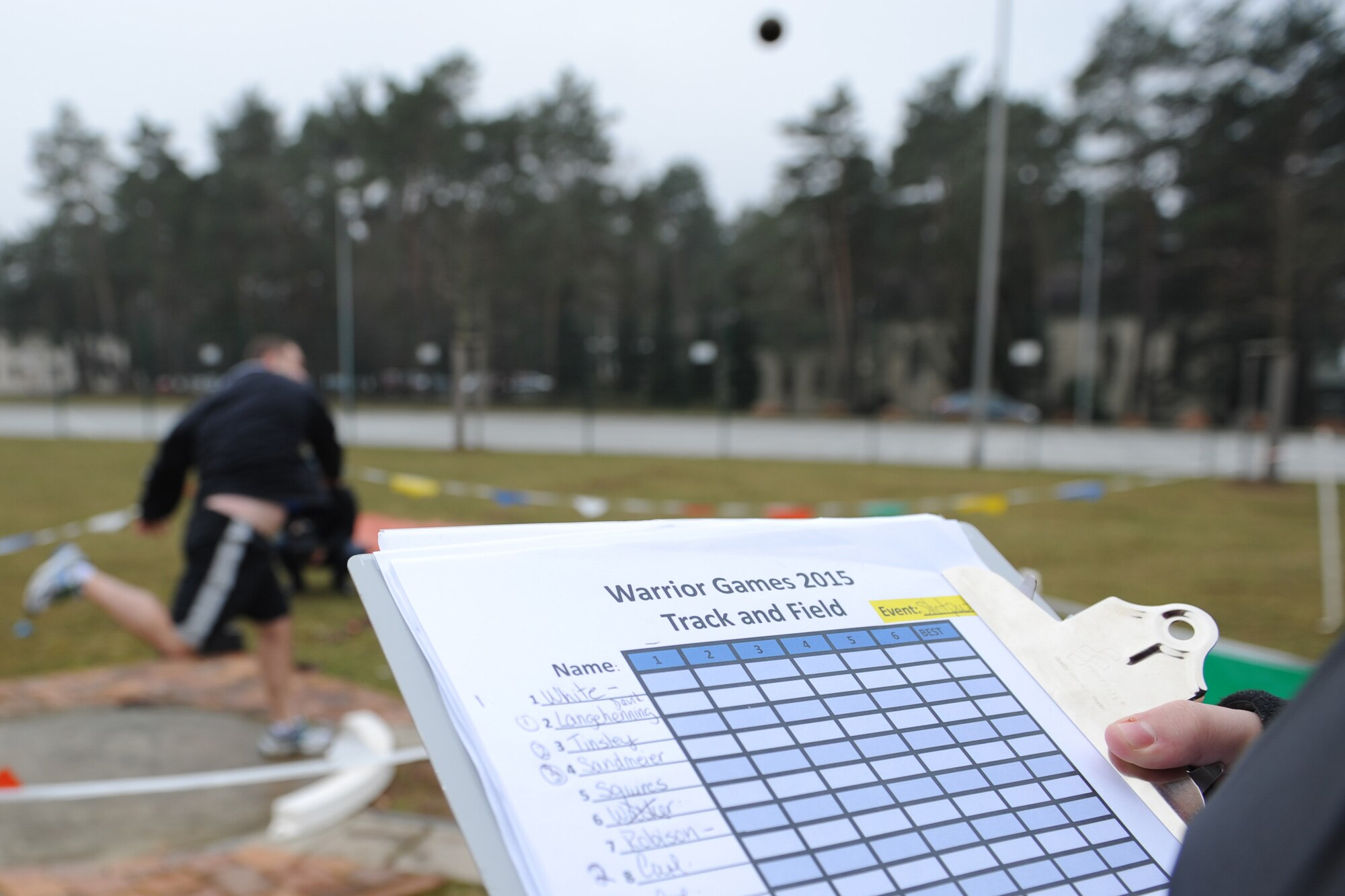 The Warrior Transition Battalion hosted the European Regional Warrior Games time trials for wounded warriors on Vogelweh Air Base, Germany, Feb. 12, 2015. Wounded warriors from Baumholder, Kaiserslautern, Wiesbaden, Stuttgart, Vilseck and Grafenwoehr came out to compete in air rifle, the 1,500-meter run, 100-meter dash, 200-meter dash, shot put, discus and a bike competition. (U.S. Air Force Photo/Airman 1st Class Michael Stuart) 