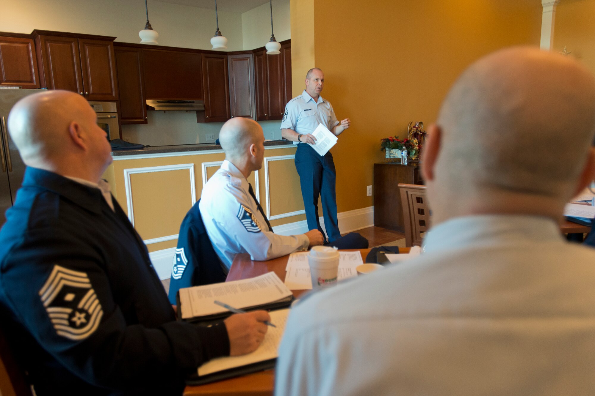 Chief Master Sgt. James W. Hotaling, the command chief master sergeant of the Air National guard discusses the recently approved Airman Comprehensive Assessment feedback form during a meeting of selected ANG Airman at Joint Base Andrews, Md. December, 2014. (U.S. Air National Guard photo by Master Sgt. Marvin R. Preston/ Released)