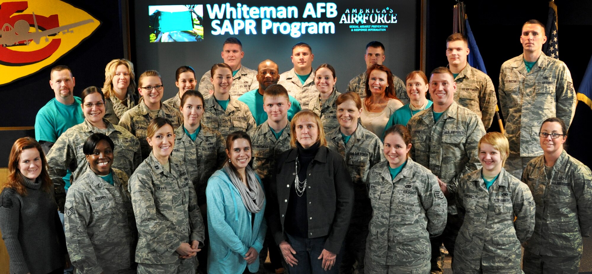 Members of the 509th Bomb Wing Sexual Assault Prevention and Response (SAPR) program pose for a group photo at Whiteman Air Force Base, Mo., Jan. 7, 2015. The Whiteman AFB SAPR program recently won the Air Force Global Strike Command SAPR Program of the Year award for the second year in a row.  They are currently competing at the Air Force level. (Courtesy photo)