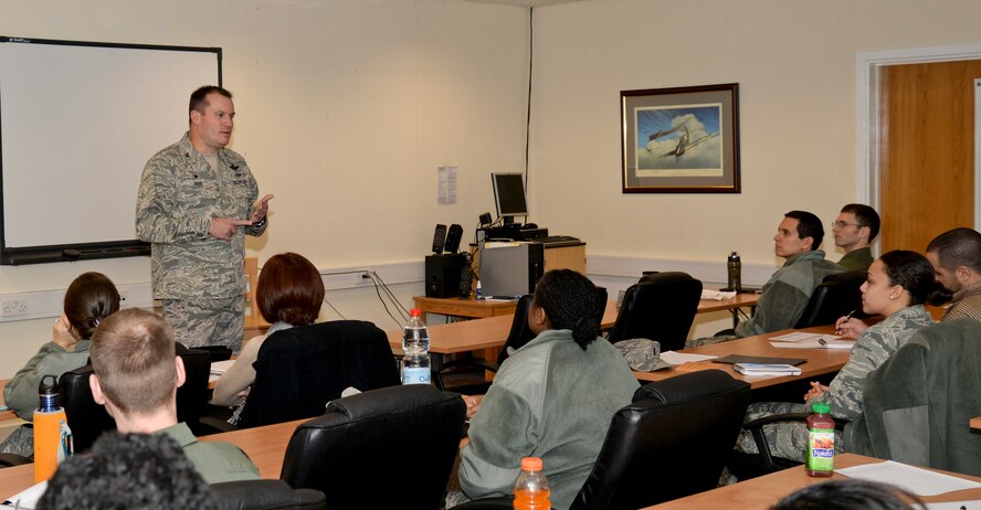 U.S. Air Force Col. Kenneth T. Bibb Jr., 100th Air Refueling Wing commander, speaks during the flight commanders’ course Feb. 4, 2015, at the Professional Development Center on RAF Mildenhall, England. The course focused on enhancing a flight commander’s leadership, management and supervisory skills, and included guest speakers from leadership on base. (U.S. Air Force photo by Airman 1st Class Jonathan Light/Released)
