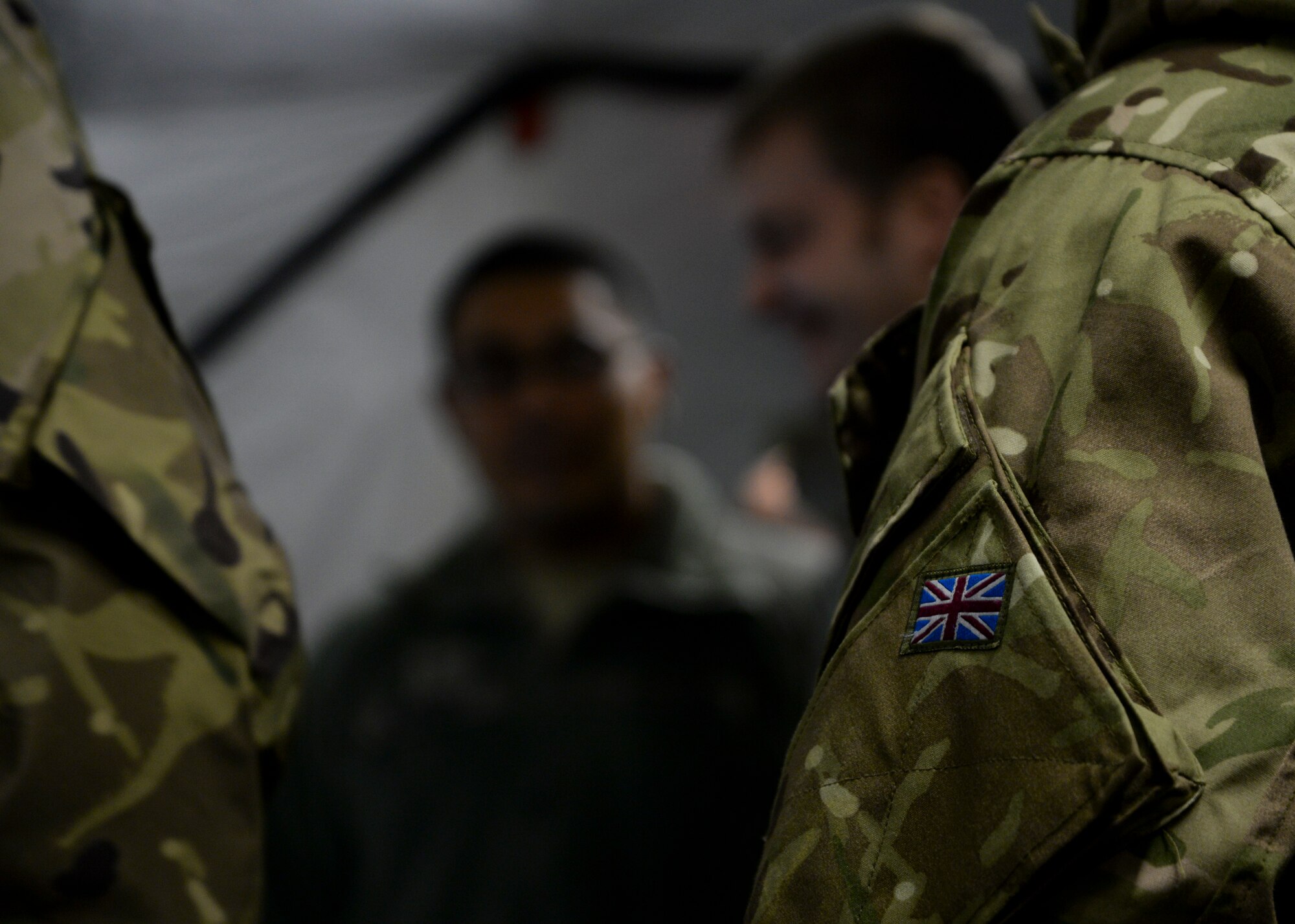 U.S. Air Force Airmen from the 352nd Special Operations Support Squadron discuss various operations during an exercise Jan. 28, 2015, on RAF Mildenhall, England. The exercise gave Airmen a chance to test new equipment as well as stay prepped and ready for mission requirements. (U.S. Air Force photo by Senior Airman Victoria H. Taylor/Released)