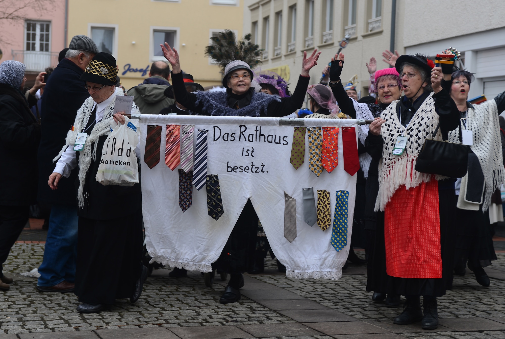 Female citizens of Bitburg, Germany, march into the city square during the 2015 Storming of the Rathaus Fasching event in Bitburg, Germany, Feb. 12, 2015. More than 250 people participated in the city’s Fasching celebration. (U.S. Air Force photo by Airman 1st Class Luke Kitterman/Released)