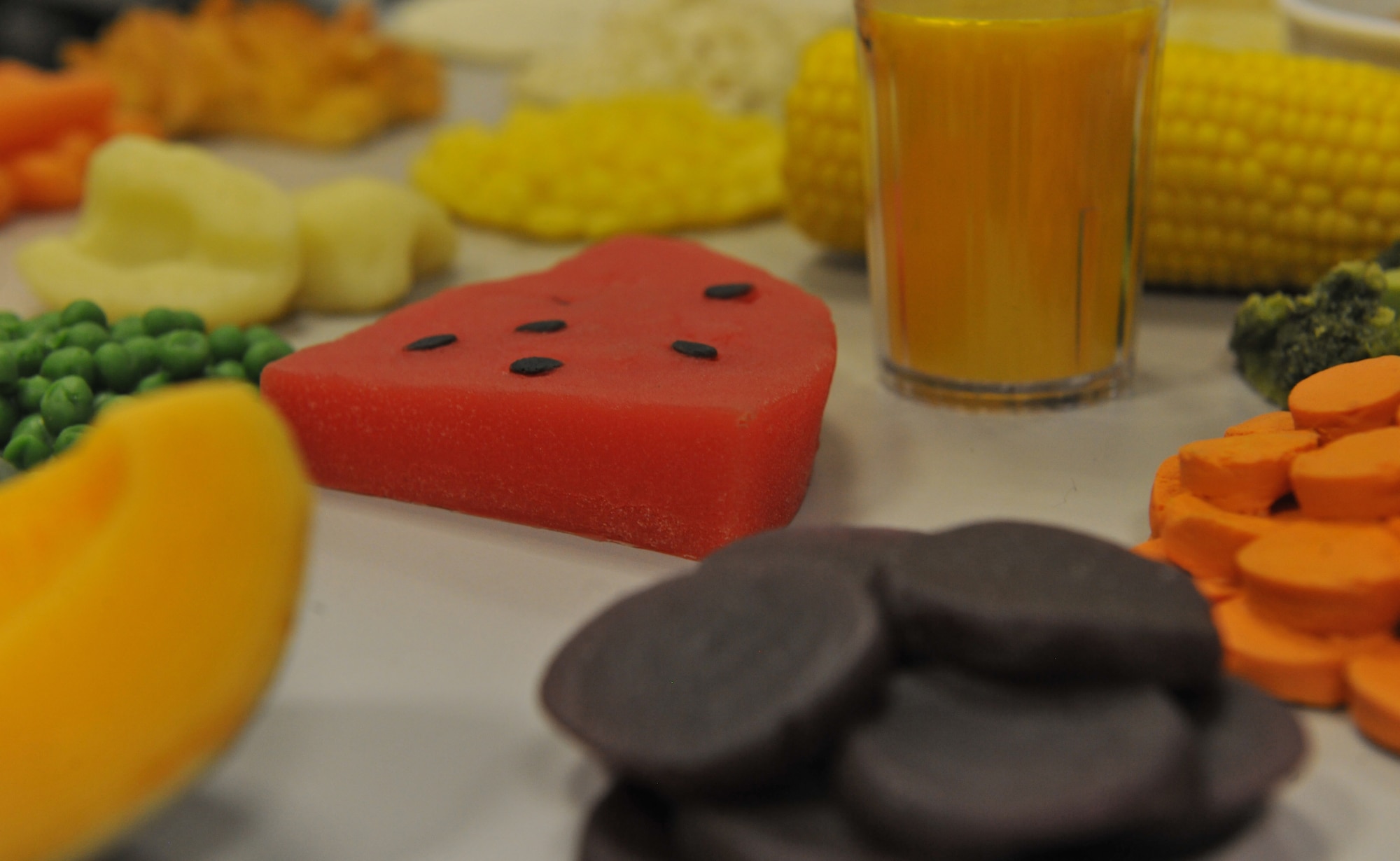 Rubber props lay on the table for the Healthy Living Class at Ramstein Air Base, Germany, Feb. 9 ,2015. They are used as visual displays to show proper proportions of various types of food. (U.S. Air Force photo/A1C Tryphena Mayhugh)