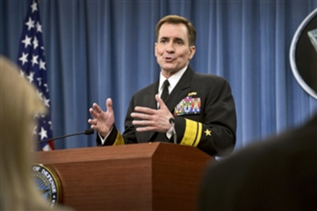 Pentagon Press Secretary Navy Rear Adm. John Kirby takes questions during a press briefing at the Pentagon, Feb. 13, 2015. Kirby updated reporters on the transition between outgoing Defense Secretary Chuck Hagel and Ash Carter, the incoming defense secretary who soon will be sworn in. Kirby also discussed recent attacks in Iraq by the Islamic State in Iraq and the Levant.