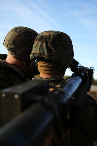 Cpl. Justin M. Goodchild, left, assists Pfc. Luis A. Chavez locate a simulated enemy target during ground-based air defense training at Marine Corps Outlying Field Atlantic, N.C., Feb. 3, 2015. Both Goodchild and Chavez are low altitude air defense gunners with Alpha Battery, 2nd Low Attitude Air Defense Battalion, at Marine Corps Air Station Cherry Point, N.C. Goodchild is a native of Longwood, Fla., and Chavez is a native of Beaumont, Calif.