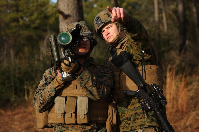 Cpl. Justin M. Goodchild, right, assists Pfc. Luis A. Chavez with locating a simulated enemy target during ground-based air defense training at Marine Corps Outlying Field Atlantic, N.C., Feb. 3, 2015. Both Goodchild and Chavez are low altitude air defense gunners with Alpha Battery, 2nd Low Altitude Air Defense Battalion at Marine Corps Air Station Cherry Point, N.C. Goodchild is a native of Longwood, Fla., and Chavez is a native of Beaumont, Calif.
