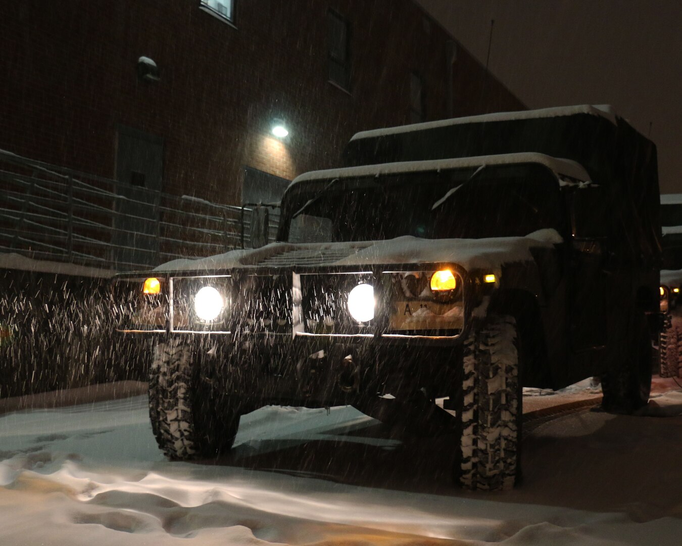 Soldiers assigned to the Fredericksburg-based 116th Brigade Special Troops Battalion, 116th Infantry Regiment, 116th Infantry Brigade Combat Team, prepare a equipment for possible winter storm operations Feb. 16, 2015, in Fredericksburg, Virginia. The Virginia National Guard was authorized to bring up to 300 Soldiers, Airmen and members of the Virginia Defense Force on state active duty for possible assistance with the state’s severe weather response operations.