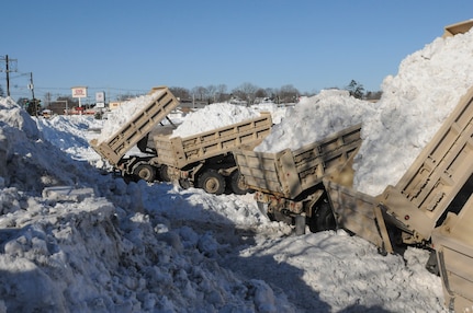 Soldiers from Detachment 1, 131st Engineer Company, Vermont Army National Guard assisted the town of Brockton, Massachusetts, with snow removal Feb. 13, 2015. The Massachusetts Emergency Management Agency coordinated the effort after the governor declared a state of emergency earlier this week. National Guardsmen from Vermont and Maine are helping their Massachusetts counterparts in responding to recent major snowfalls that have buried areas of the Bay State.