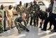 Senior Master Sgt. Phillip Leonard, center, discusses cargo pallet inspection procedures with East Africa air forces members during African Partnership Flight-Djibouti (APF) Feb. 10, 2015, at Djibouti Air Base. APF is the premiere program to bring together partner nations to increase cooperation and interoperability, which fosters stability and security throughout the continent. Leonard is a loadmaster adviser with U.S. Air Forces Europe -- Air Forces Africa. (U.S. Air Force Photo/Tech. Sgt. Ian Dean)