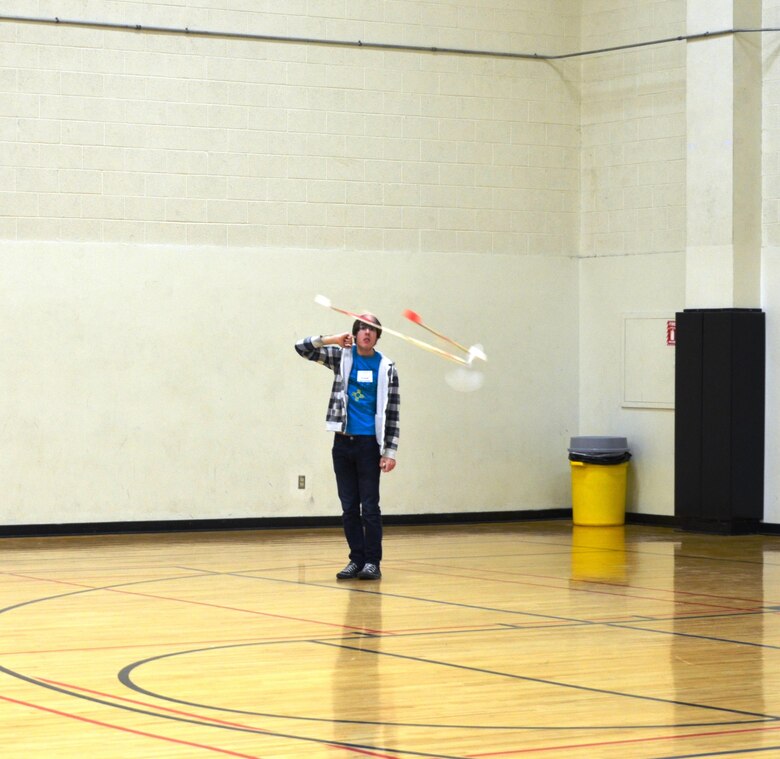ALBUQUERQUE, N.M., -- One of the students competing in the 2015 Central New Mexico Regional Science Olympiad watches his airplane in “The Wright Stuff,” one of the events of the Olympiad, Jan. 31