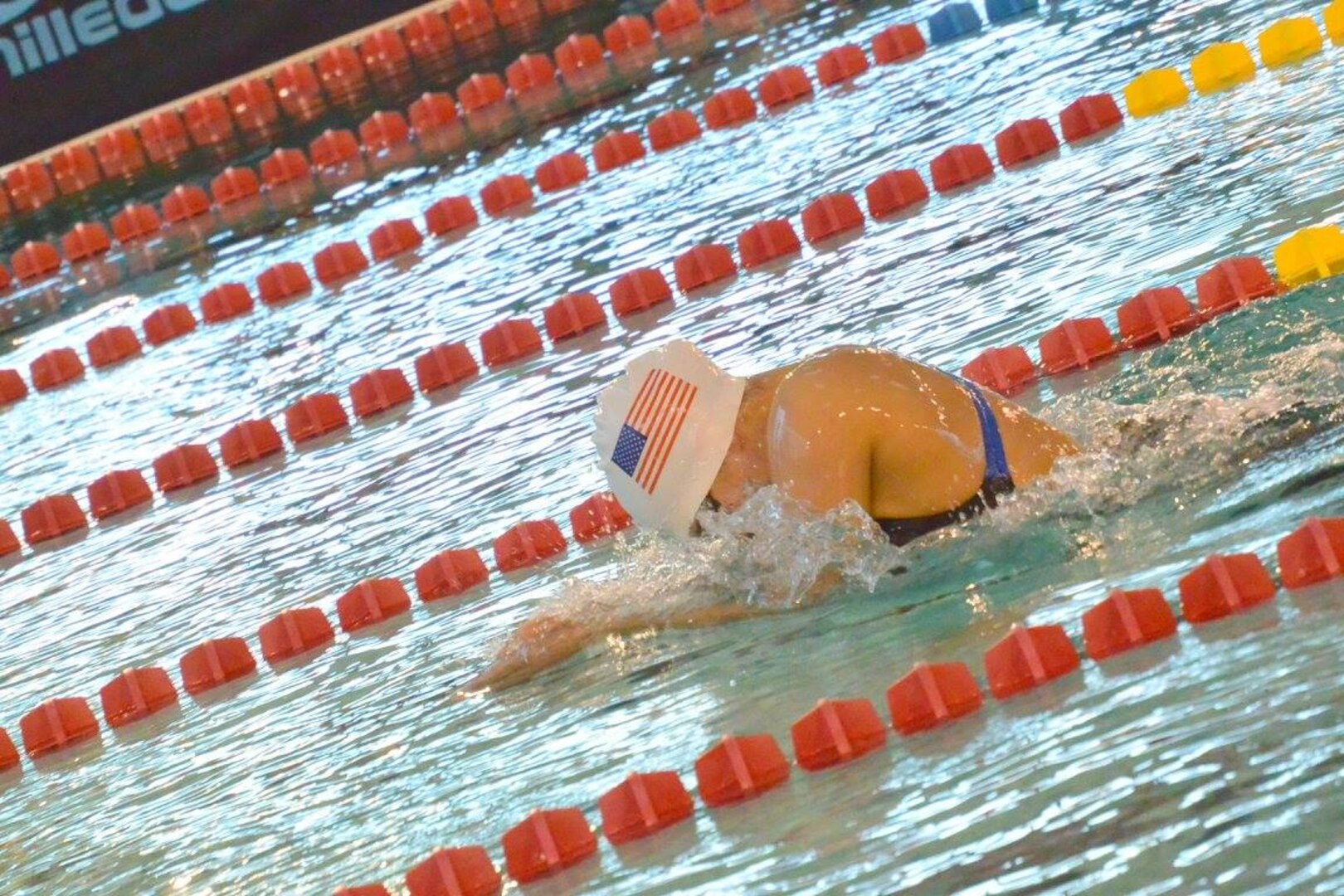 Army Sgt. Elizabeth Wasil (Ft. Carson, Colo.) races to the finish during her gold medal performance in the 100m breaststroke in the CISM ISC para-swimming classification during the 2015 Conseil International du Sport Militaire (CISM) Swimming & Para-Swimming Open.