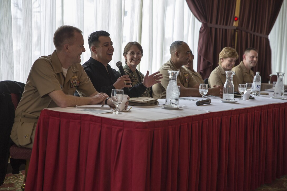 Navy and Marine Corps commanders stationed across Okinawa discuss a “commander’s perspective” Feb. 6 at the Butler Officers’ Club, Camp Foster. The event was presented by the National Naval Officers Association, and fostered an opportunity for junior officers to ask questions and learn what commanders expect of them. “The mission of the NNOA is to mentor, train and retain a diverse set of officers in the Navy, Marine Corps and Coast Guard,” said U.S. Marine Capt. Anthony Gantt. “It is not diversity in color or gender, but diversity in thought.” The leadership panel provided two hours of a discussion, in which younger officers could learn and grow as leaders. Gantt is a Miami, Florida, native and an air support control officer with Marine Air Support Squadron 2, Marine Air Control Group 18, 1st Marine Aircraft Wing, III Marine Expeditionary Force. (Marine Corps Photo by Cpl. Joey S. Holeman Jr./Released)  