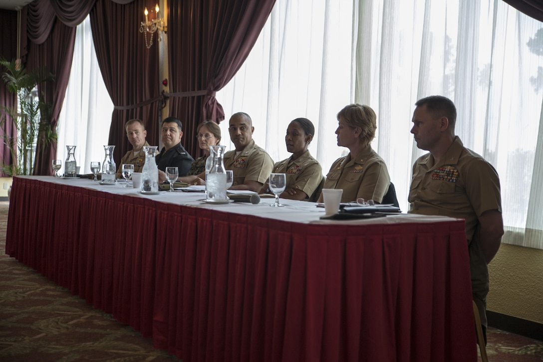 Navy and Marine Corps commanders stationed across Okinawa discuss a “commander’s perspective” Feb. 6 at the Butler Officers’ Club, Camp Foster. The event was presented by the National Naval Officers Association, and fostered an opportunity for junior officers to ask questions and learn what commanders expect of them. “The mission of the NNOA is to mentor, train and retain a diverse set of officers in the Navy, Marine Corps and Coast Guard,” said U.S. Marine Capt. Anthony Gantt. “It is not diversity in color or gender, but diversity in thought.” The leadership panel provided two hours of a discussion, in which younger officers could learn and grow as leaders. Gantt is a Miami, Florida, native and an air support control officer with Marine Air Support Squadron 2, Marine Air Control Group 18, 1st Marine Aircraft Wing, III Marine Expeditionary Force. (Marine Corps Photo by Cpl. Joey S. Holeman Jr./Released)  
