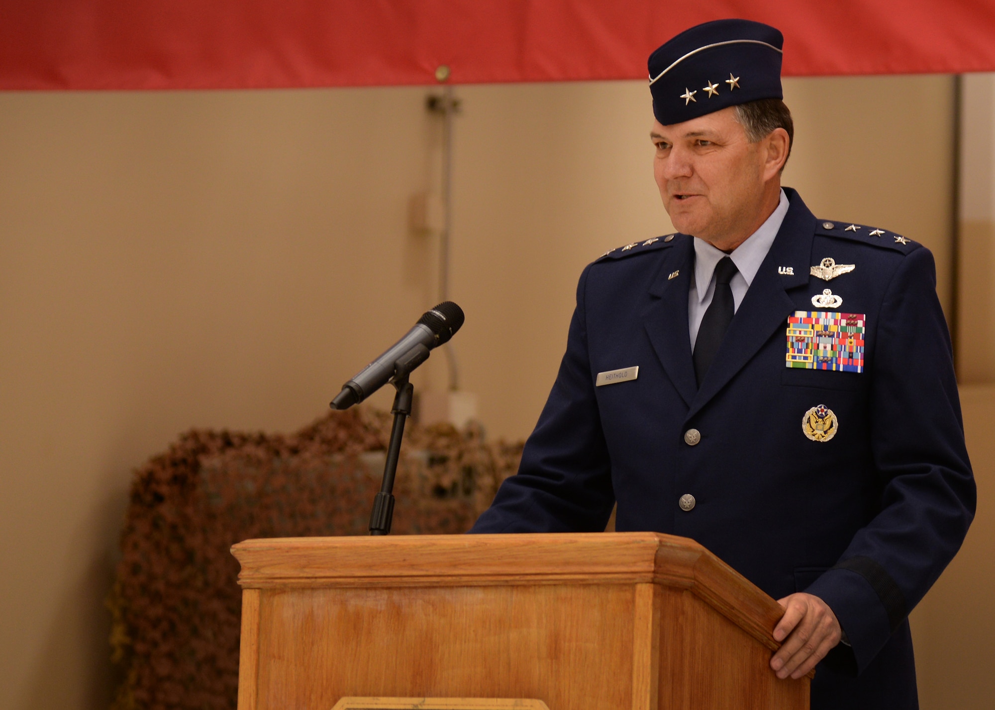 U.S. Air Force Lt. Gen. Bradley Heithold, Commander Air Force Special Operations Command, addresses Air Commandos at the 27th Special Operations Wing change of command ceremony Feb. 17, 2015 at Cannon Air Force Base, N.M. Heithold spoke with enthusiasm of both Col. Tony Bauernfeind, outgoing 27th SOW commander, and Col. Benjamin Maitre, incoming 27th SOW commander, along with the team of Airmen they lead. (U.S. Air Force photo/Airman 1st Class Chip Slack)