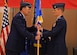 U.S. Air Force Lt. Gen. Bradley Heithold, Commander Air Force Special Operations Command, presents the guidon, representing assumption of command, to Col. Benjamin Maitre, incoming 27th SOW commander, Feb. 17, 2015 at Cannon Air Force Base, N.M. Heithold presided over the ceremony where he conveyed directly to Air Commandos his appreciation for the outstanding, sustained efforts by Team Cannon. (U.S. Air Force photo/Airman 1st Class Chip Slack) 