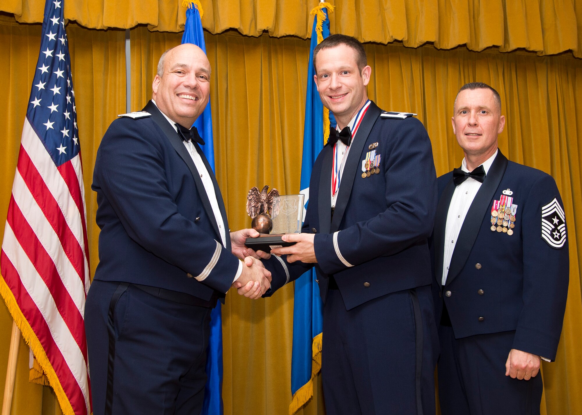 Company Grade Officer of the Year awarded to Capt. Gregory Thomas, 412th Aircraft Maintenance Squadron. (U.S. Air Force photo by Ethan Wagner)
