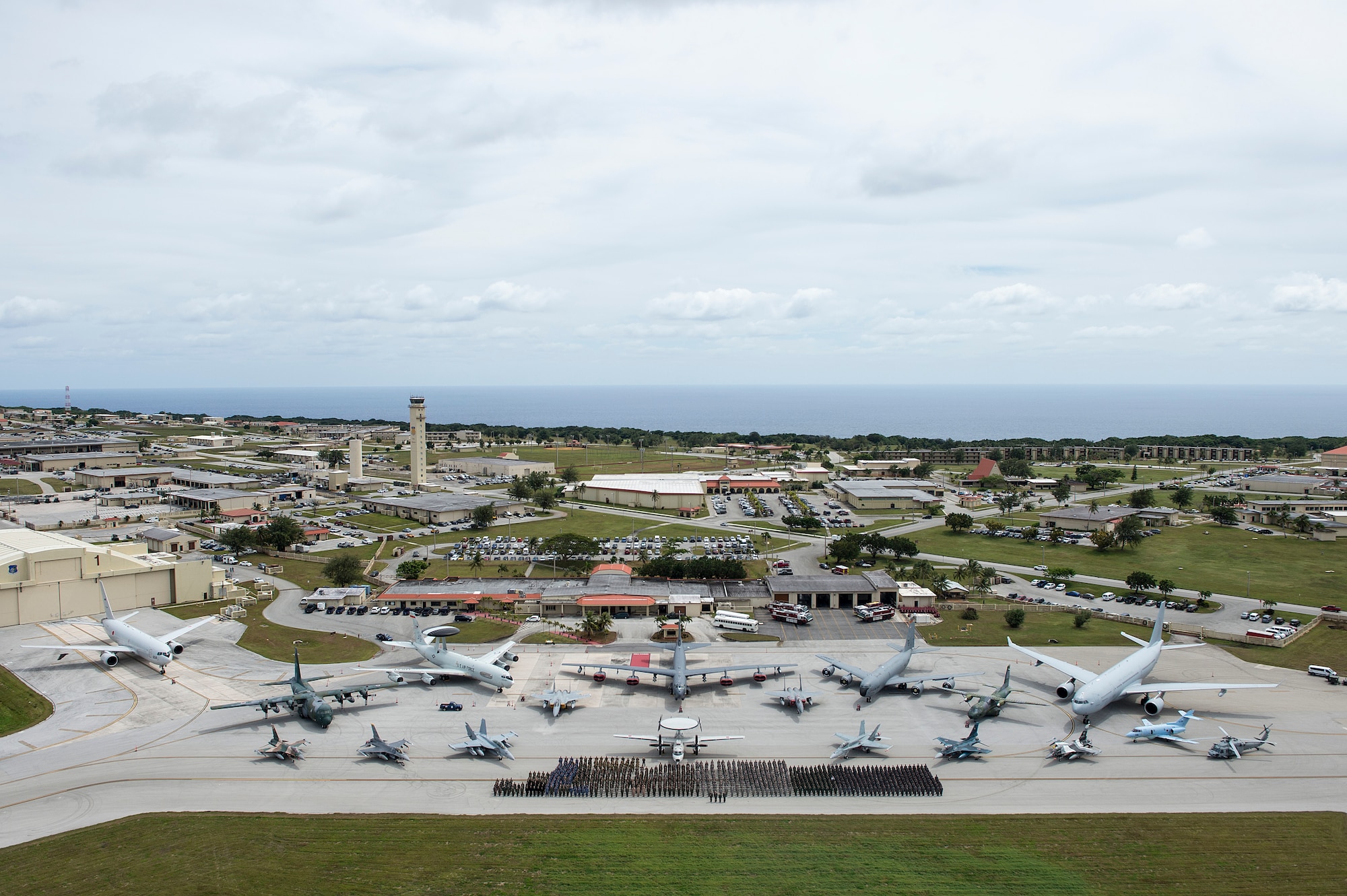 Exercise COPE NORTH 15 participates and aircraft from the U.S. Air Force, U.S. Navy, Japan Air Self-Defense Force, Royal Australian Air Force, Republic of Korea Air Force, Royal New Zealand Air Force, and Philippine Air Force participate in a group photo event Feb.13, 2015, at Anderson Air Force Base, Guam. Cope North is an annual multilateral field training exercise that emphasizes the exchange and execution of tactics, techniques and procedures, while enhancing interoperability. (U.S. Air Force photo by Tech. Sgt. Jason Robertson/Released)