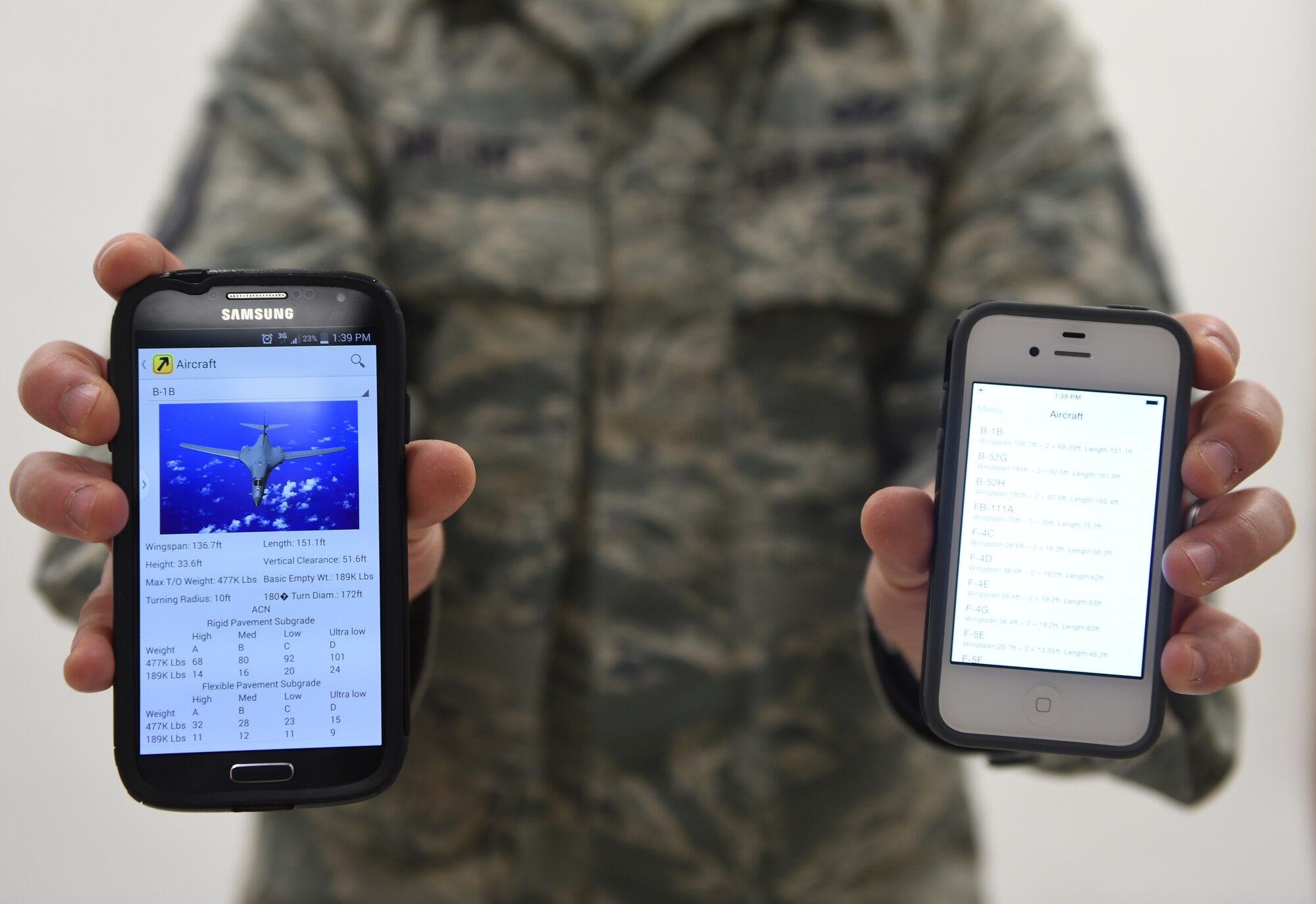 U.S. Air Force Master Sgt. Terrance Miller, 7th Operation Support Squadron airfield manager, presents the Airfield Manager app and the 2015 Dyess Big Country Airfest app Feb. 3, 2015, at Dyess Air Force Base, Texas, which he designed. Miller programmed an app for airfield management that allows Airmen to track and document runway damages and repairs, and an app for the 2015 Dyess Big Country Airfest that will give spectators an interactive airshow map and provide information on the planes that will be on display there. (U.S. Air Force photo by Airman 1st Class Alexander Guerrero/Released)
