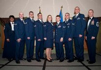 Pictured from left to right are: Chief Master Sgt. Felica Noil, 91st Missile Wing command chief; Senior Airman Melvin Duncan, 5th Aircraft Maintenance Squadron; Senior Airman Christopher Sturgeon, 705th Munitions Squadron; Senior Airman Christian Miller, 5th AMXS; Senior Airman Aubrey Simpson, 5th Operations Support Squadron; Senior Airman Brandon Verwey, 5th Civil Engineer Squadron; Senior Airman Seth Swanstrom, 91st Missile Security Forces Squadron; Senior Airman Matthew Hardwig, 5th Maintenance Squadron and Chief Master Sgt. Weimer, 5th Bomb Wing command chief. (U.S. Air Force photo/Airman 1st Class Sahara Fales) 