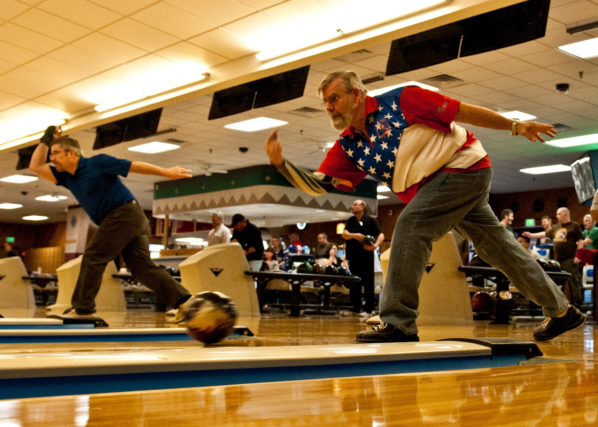 PETERSON AIR FORCE BASE, Colo. – Dixon Scholfield, member of the Magnificent Seven bowling league team, participates in a tournament at the Peterson Bowling Center, Feb. 5, 2015. The Magnificent Seven team won the intramural league twice and is pursuing a third victory. Sixteen teams and approximately 150 bowlers participate in the intramural competitions twice a week. (U.S. Air Force photo by Senior Airman Tiffany DeNault)