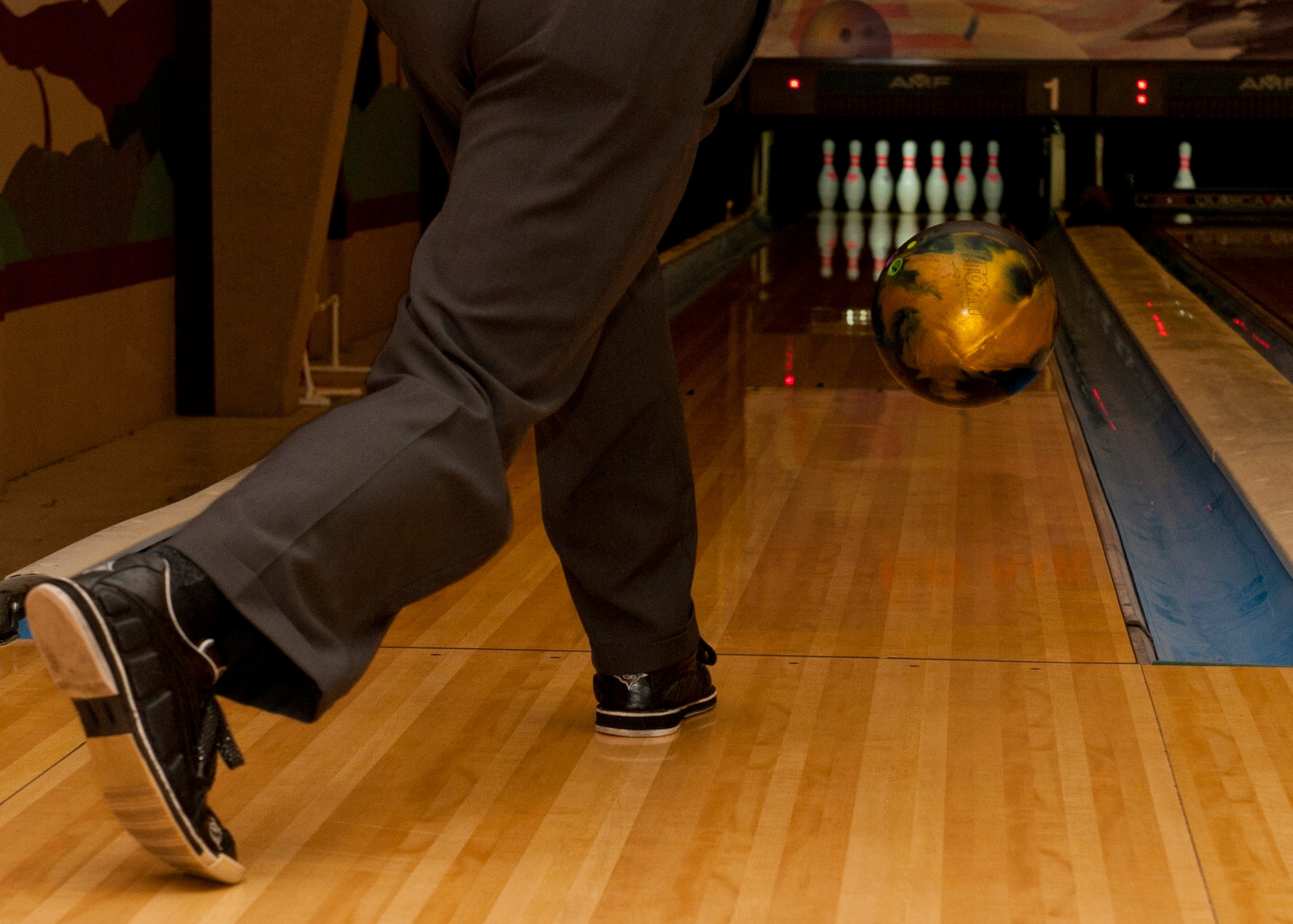 PETERSON AIR FORCE BASE, Colo. –Members of the Magnificent Seven bowling league team participate in a bowling tournament at the Peterson Bowling Center, Feb. 5, 2015. The Magnificent Seven team won the intramural league twice and is pursuing a third victory. Sixteen teams and approximately 150 bowlers participate in the intramural competitions twice a week. (U.S. Air Force photo by Senior Airman Tiffany DeNault) 