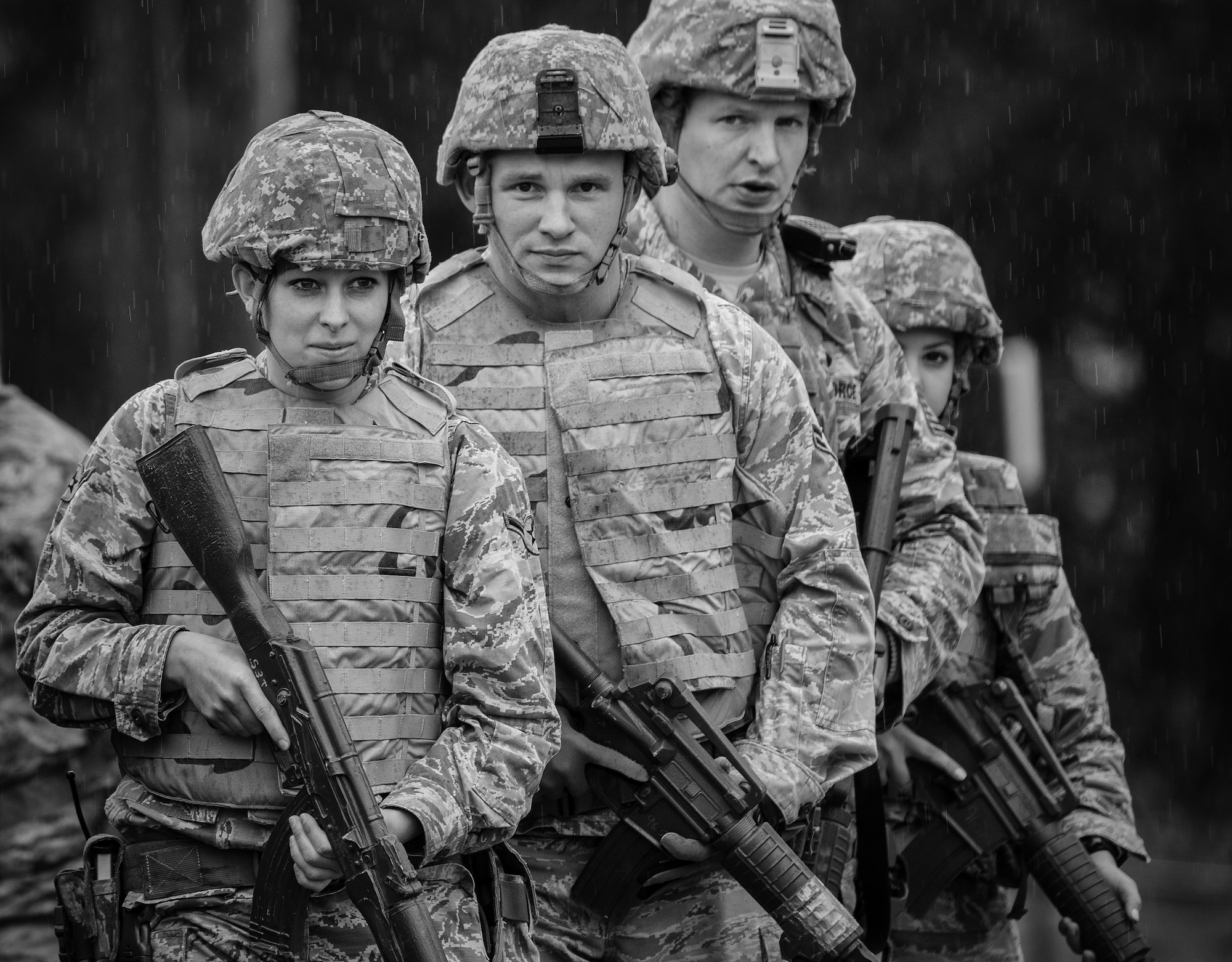 Airmen with the 96th Security Forces Squadron wait to enter the building during an active shooter exercise Feb. 4 at Duke Field, Fla.  The Airmen entered the building to apprehend the suspect, assess the wounded and report back information to the emergency responders. (U.S. Air Force photo/Samuel King Jr.)