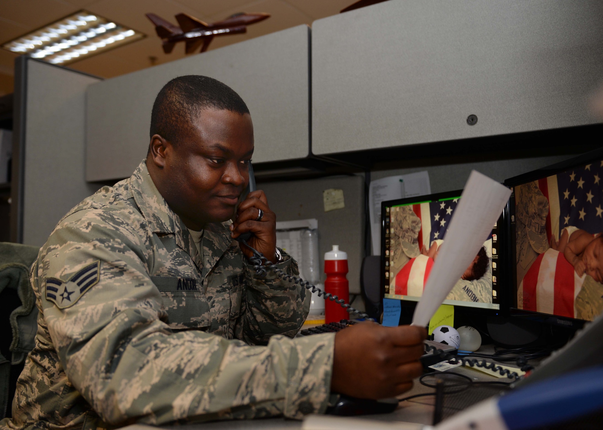 Senior Airman Timothy Andoh, 28th Force Support Squadron customer service technician, reviews in-processing paperwork in the Rushmore Center at Ellsworth Air Force Base, S.D., Jan. 22, 2015. As part of the military personnel flight, Andoh works with Airmen new to Ellsworth, verifying they have all necessary paperwork and all actions have been taken to ensure a smooth transition for them and their families. (U.S. Air Force Photo by Airman 1st Class Rebecca Imwalle/Released)