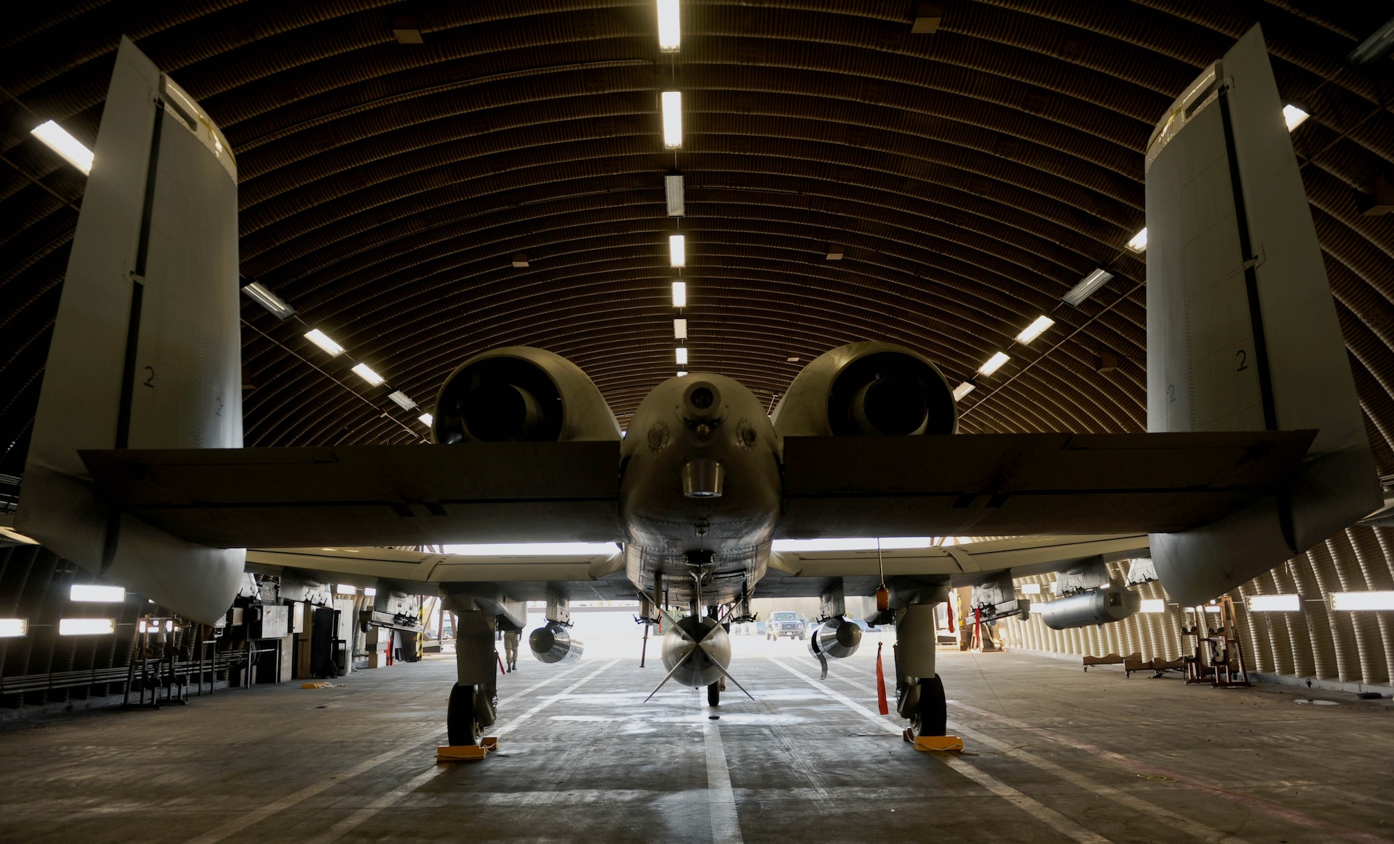 An A-10 Thunderbolt II aircraft assigned to the 354th Expeditionary Fighter Squadron sits inside a hardened aircraft shelter at Spangdahlem Air Base, Germany, Feb. 13, 2015. The A-10s deployed as part of a theater security package in support of Operation Atlantic Resolve. The Air Force has been conducting similar TSP rotations in the Pacific region since 2004. (U.S. Air Force photo by Airman 1st Class Timothy Kim/Released)