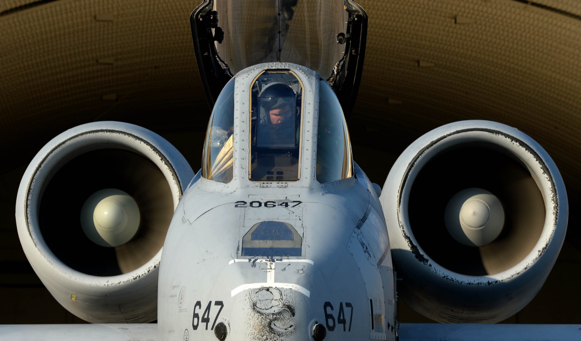 A U.S. Air Force pilot sits in an A-10 Thunderbolt II aircraft assigned to the 354th Expeditionary Fighter Squadron on the flight line at Spangdahlem Air Base, Germany, Feb. 13, 2015. The A-10s deployed as part of a theater security package in support of Operation Atlantic Resolve. Operation Atlantic Resolve is a demonstration of U.S. European Command and United States Air Forces in Europe's continued commitment to the collective security of the North Atlantic Treaty Organization and dedication to the enduring peace and stability in the region. (U.S. Air Force photo by Airman 1st Class Timothy Kim/Released)