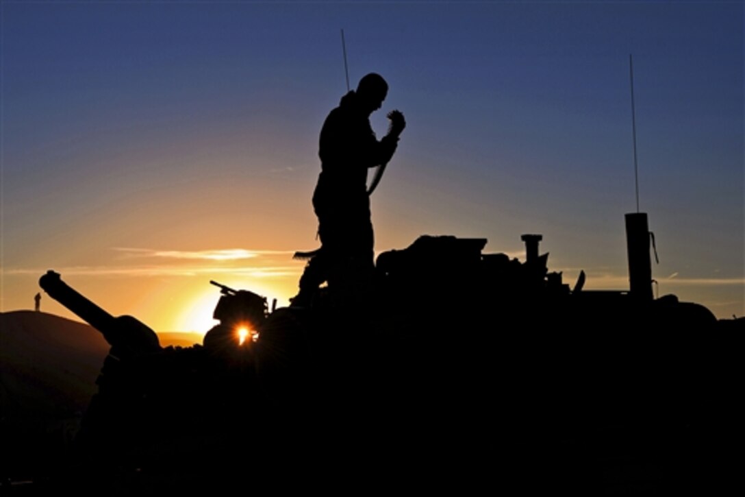 A Marine prepares ammunition before a tank offensive during Integrated Training Exercise 2-15 on Marine Corps Air Ground Combat Center Twentynine Palms, Calif., Feb. 12, 2015. The Marines, assigned to the 1st Marine Division's Delta Company, 1st Tank Battalion, 1st Marine Expeditionary Force, conduct relevant live-fire training, urban operations and integration training that promotes operational forces readiness.