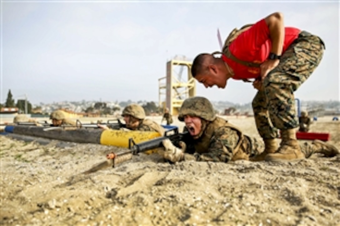 Recruits run through a bayonet assault course on Marine Corps Recruit Depot San Diego, Feb. 2, 2015. The exercise included tire stabbing, getting in and out of a trench and using commands to conduct a combat rush. The recruits are assigned to Bravo Company, 1st Recruit Training Battalion.