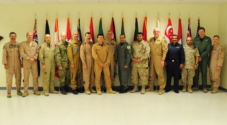 Senior military representatives from 15 of the 17 nations providing support to the air campaign against Da’esh gather for a photo, Feb. 11, at Al Udeid Air Base, Qatar. The representatives attended the Operation INHERENT RESOLVE Air Coalition Conference. (U.S. Air Force photo/Staff Sgt. Chelsea Browning)