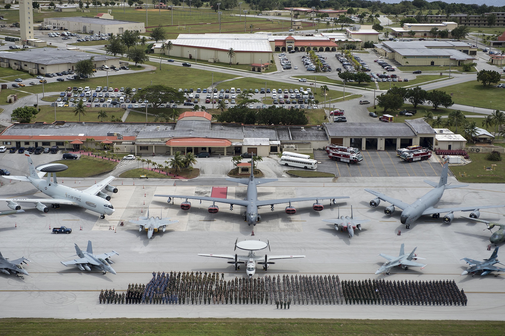 Exercise Cope North 15 participants and aircraft from the U.S. Air Force, U.S. Navy, Japan Air Self-Defense Force, Royal Australian air force, South Korean air force, Royal New Zealand air force, and Philippine air force participate in a group photo event Feb.13, 2015, at Anderson Air Force Base, Guam. Cope North is an annual multilateral field training exercise that emphasizes the exchange and execution of tactics, techniques and procedures, while enhancing interoperability. (U.S. Air Force photo/Tech. Sgt. Jason Robertson)