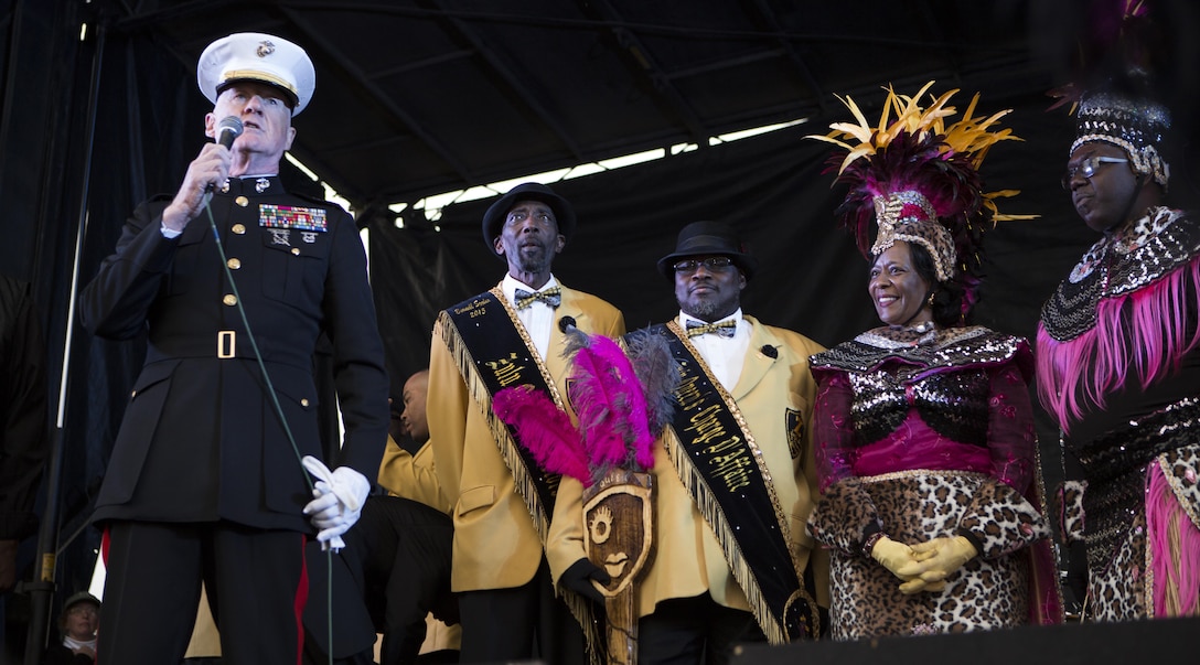 Lt. Gen. Richard P. Mills, commander of Marine Forces Reserve, stands next to the Zulu King and Queen as he speaks to the crowd celebrating the Zulu Lundi Gras 
Festival in downtown New Orleans, Feb. 16, 2015. Mills was joined by Sgt. Maj. Anthony A. Spadaro, sergeant major of MARFORRES, and Gregg T. Habel, executive director of 
MARFORRES, to celebrate Mardi Gras and show the military’s support to the 
New Orleans community. 
