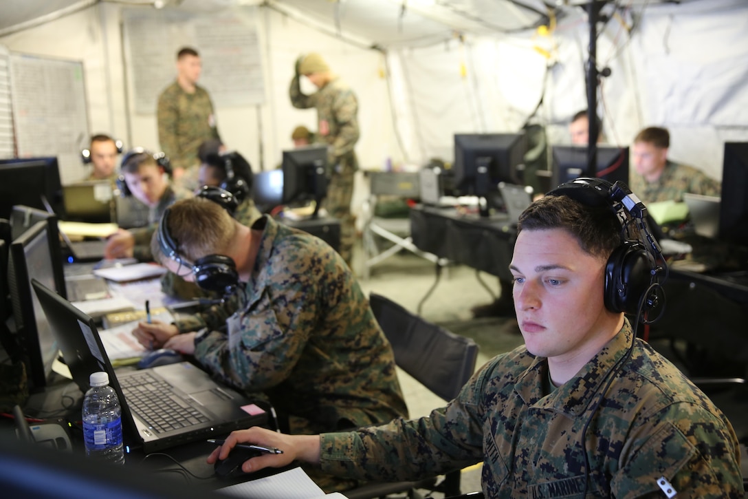Marines conduct a Marine Air Command and Control System Integrated Exercise, from inside Marine Air Support Squadron 1’s Direct Air Support Center at Marine Corps Air Station Cherry Point N.C., Feb. 3, 2015. The purpose of the exercise was to conduct readiness enhancing integrated training to ensure 2nd Marine Aircraft Wing maintains a high state of aviation command and control.