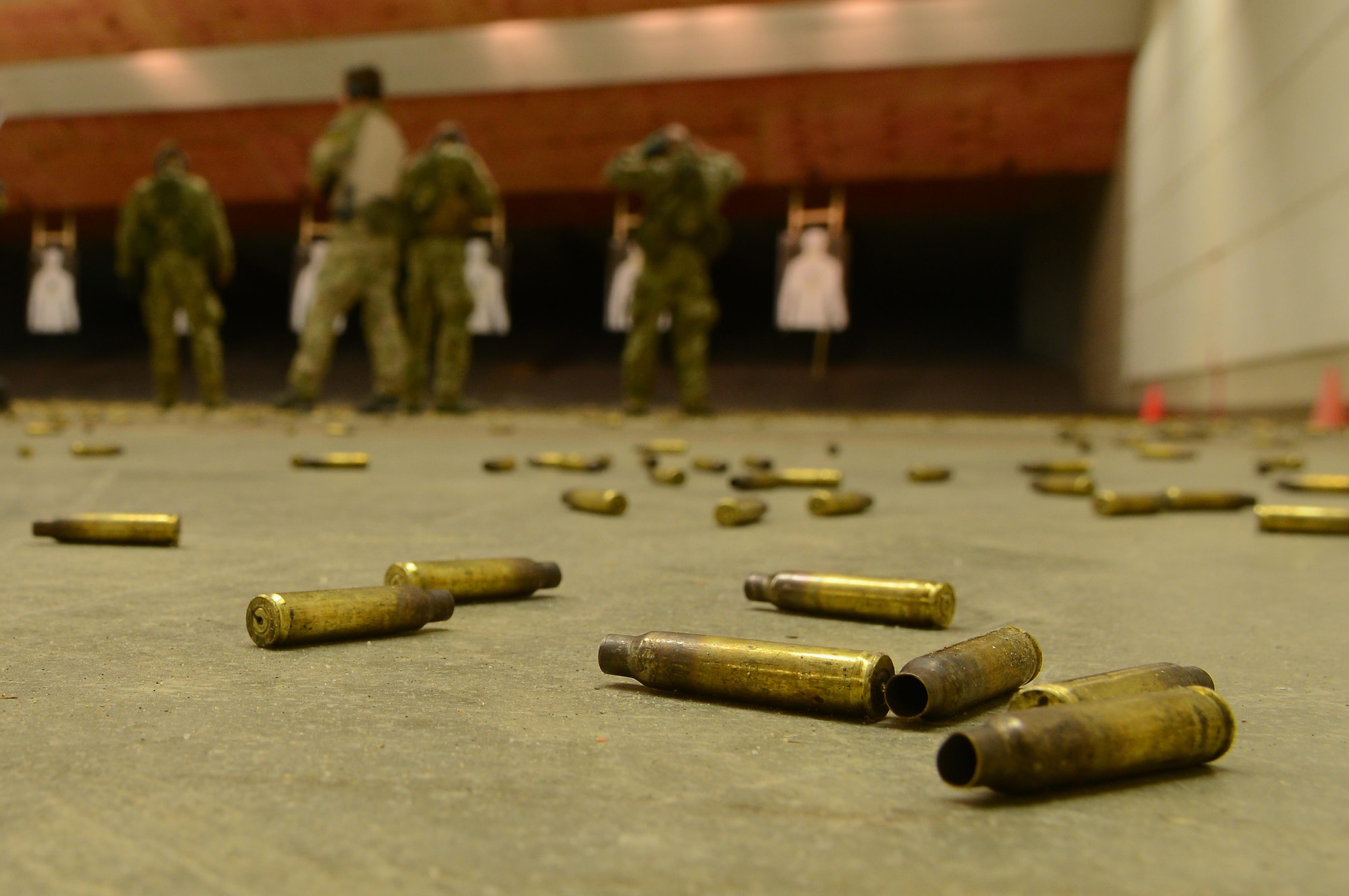 5.56mm ammunition rounds are discarded after U.S. Air Force Combat Control trainees assigned to Operating Location C, 342nd Training Squadron, spend a day shooting their M4 rifles at Pope Army Airfield, North Carolina, Feb. 11, 2015. CCT and Special Operations Weathers Team trainees spend approximately two years in training before they are assigned to a unit. (U.S. Air Force photo by Airman 1st Class Michael Cossaboom)