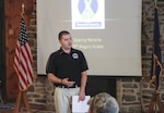 Capt. Gregory Kuleba, Yellow Ribbon Program Coordinator for the Pennsylvania Army National Guard kicks-off the 30 day post-deployment Yellow Ribbon event for 252nd Engineer Company, 213th Regional Support Group, Pennsylvania Army National Guard.