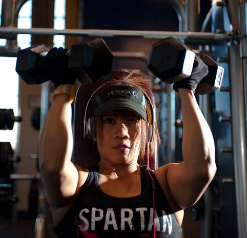 Lei Govan, a member of the Mike O’ Callaghan Federal Medical Center, lifts weights at the Warrior Fitness Center Feb. 18, 2015. Weightlifting can help burn fat, reduce the risk of diabetes, prevent back pain and help fight depression. The fitness center is open Monday through Friday from 4:30 a.m. to 10 p.m., Saturday and Sunday from 6:30 a.m. to 7 p.m. and 8 a.m. to 5 p.m. on holiday and down days. For more information call the Warrior Fitness Center at 702-652-4891. (U.S. Air Force photo by Airman 1st Class Mikaley Towle)