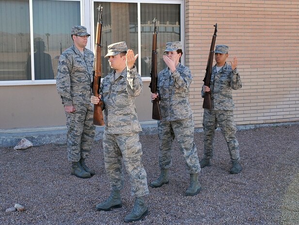 Members of the Nellis Air Force Base Honor Guard practice a firing party sequence at Nellis AFB, Nev. Feb. 17, 2015. The Firing Party pays final tribute to the deceased with the firing of three rounds of seven volleys. (U.S. Air Force photo by Airman 1st Class Rachel Loftis))