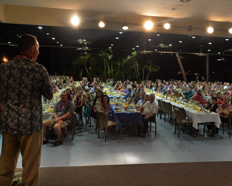 Col. Randy Huiss, 15th Wing commander, gives his closing remarks during the 15th Wing 2014 Annual Awards Luau at the Historic Hickam Officers' Club on Joint Base Pearl Harbor-Hickam, Hawaii, Feb. 13, 2015. Huiss congratulated all the nominees and award winners and continued by thanking everyone across the wing for all their hard work in 2014. (U.S. Air Force photo by Tech. Sgt. Aaron Oelrich/Released)