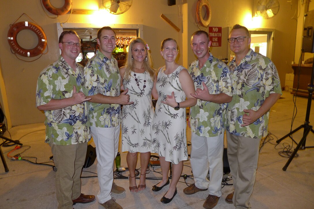 Wake Island, US Territory-- USAF Band of the Pacific-Hawaii, Small Kine poses for a picture with PACAF Band Commander Capt. Haley Armstrong. From left: SrA Brian Plank, SSgt Nicholas Daniels, SSgt Courtney Clifford, Capt. Haley Armstrong, SSgt Aaron Kusterer, and TSgt Troy Griffin. (U.S. Air Force photo by TSgt Michael Smith) (released)