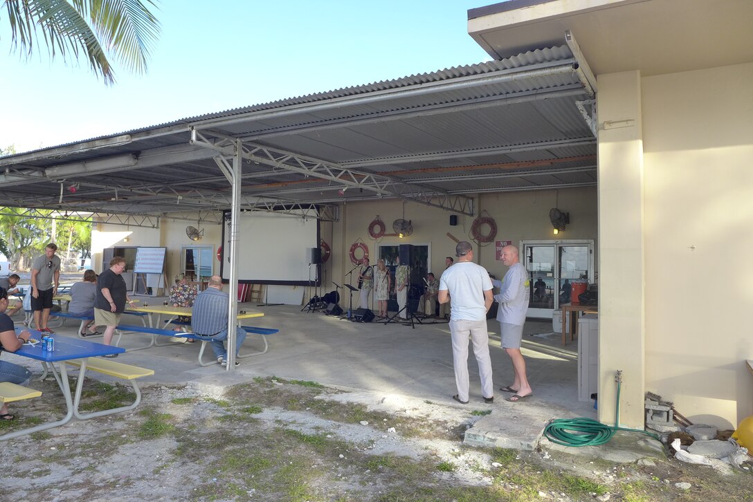 Wake Island, US Territory-- Audience members enjoy some food while Small Kine performs. (U.S. Air Force photo by TSgt Michael Smith) (released)
